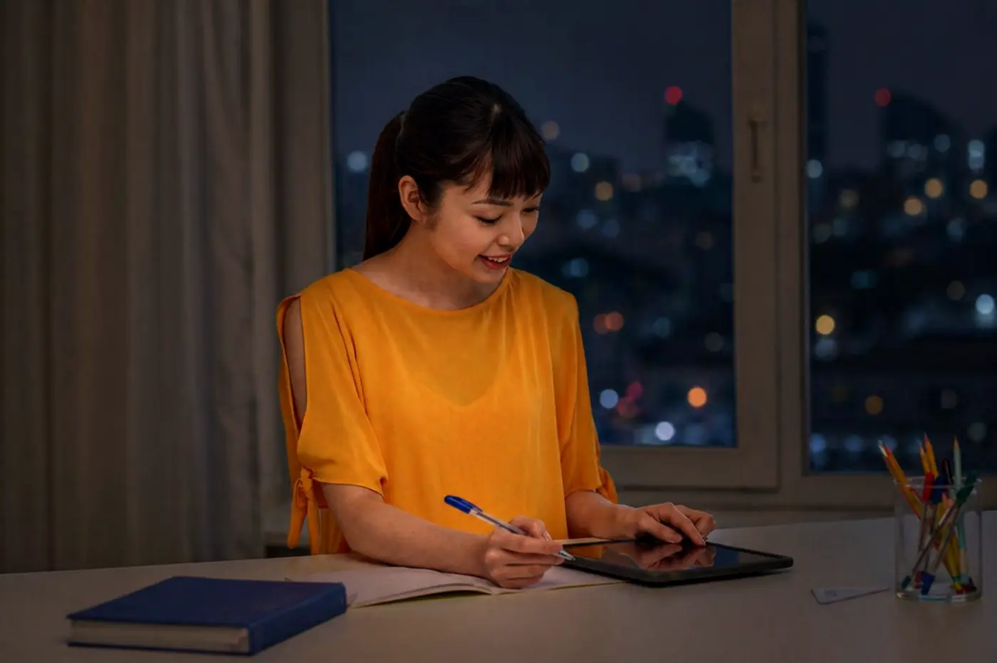 Online English student studying at night